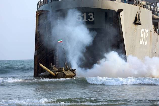 February 23, 2025, Konarak, Sistan And Baluchestan, Iran: The amphibious operation, along with beaching and coastal defense activities, conduct by Navy rangers with the assistance of a Navy frigate and the armored units of the Islamic Republic of Iran Army s Ground Forces in the third maritime zone of Konarak in the Persian Gulf. An amphibious operation refers to a coordinated attack from the sea, performed by naval and land forces deploying from ships, aimed at striking the enemy s shoreline and culminating in troops landing on those shores. Konarak Iran - ZUMAi98_ 20250223_zih_i98_046 Copyright: xIranianxArmyxOfficex