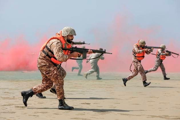 February 23, 2025, Konarak, Sistan And Baluchestan, Iran: The amphibious operation, along with beaching and coastal defense activities, conduct by Navy rangers with the assistance of a Navy frigate and the armored units of the Islamic Republic of Iran Army s Ground Forces in the third maritime zone of Konarak in the Persian Gulf. An amphibious operation refers to a coordinated attack from the sea, performed by naval and land forces deploying from ships, aimed at striking the enemy s shoreline and culminating in troops landing on those shores. Konarak Iran - ZUMAi98_ 20250223_zih_i98_068 Copyright: xIranianxArmyxOfficex