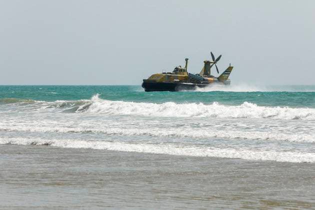 February 23, 2025, Konarak, Sistan And Baluchestan, Iran: The amphibious operation, along with beaching and coastal defense activities, conduct by Navy rangers with the assistance of a Navy frigate and the armored units of the Islamic Republic of Iran Army s Ground Forces in the third maritime zone of Konarak in the Persian Gulf. An amphibious operation refers to a coordinated attack from the sea, performed by naval and land forces deploying from ships, aimed at striking the enemy s shoreline and culminating in troops landing on those shores. Konarak Iran - ZUMAi98_ 20250223_zih_i98_073 Copyright: xIranianxArmyxOfficex