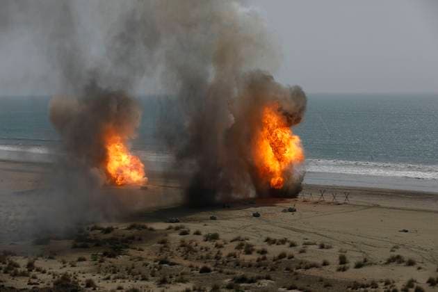 February 23, 2025, Konarak, Sistan And Baluchestan, Iran: The amphibious operation, along with beaching and coastal defense activities, conduct by Navy rangers with the assistance of a Navy frigate and the armored units of the Islamic Republic of Iran Army s Ground Forces in the third maritime zone of Konarak in the Persian Gulf. An amphibious operation refers to a coordinated attack from the sea, performed by naval and land forces deploying from ships, aimed at striking the enemy s shoreline and culminating in troops landing on those shores. Konarak Iran - ZUMAi98_ 20250223_zih_i98_086 Copyright: xIranianxArmyxOfficex