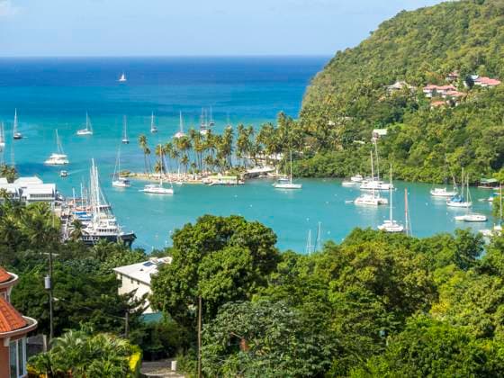 Scenic view of Marigot Bay in St Lucia with sailboats and lush greenery, AMF10039