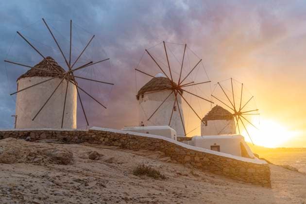 Windmills on the island of Mykonos at sunset in autumn, Mykonos Greece TAMF04722
