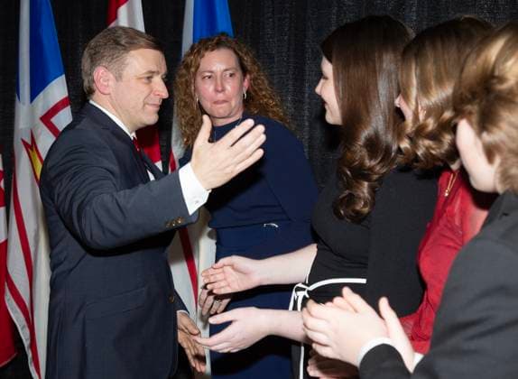 February 25, 2025, St. John s, Nl, CANADA: Newfoundland and Labrador Premier Andrew Furey greets family members, wife Allison and children Maggie, Rachel and Mark after he announced his resignation as premier in St.John s, Tuesday, Feb.25, 2025. St. John s CANADA  - ZUMAc35_ 20250225_zaf_c35_032 Copyright: xPaulxDalyx