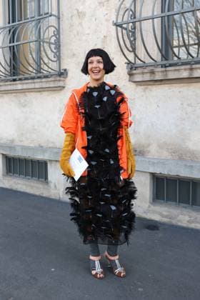 February 27, 2025, Milan, Lombardia, Italy: Milan Womens Fashion Week is taking place from February 25 to March 2, 2025. Fashionistas pose for photographers before the Prada FW 2025-2026 fashion show. Milan Italy - ZUMAt227 20250227_zip_t227_008 Copyright: xMarinaxTakimotox
