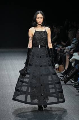 Milan, Milan Women s Fashion Week: Fall Winter 2025 - Emporio Armani Fashion Show - model Milan, Milan Women s Fashion Week: Fall Winter 2025 - Women s Fashion, Fall Winter 2025.- Emporio Armani fashion show - guests in the photo: model MILAN Italy  Copyright: xIPA ABACAx