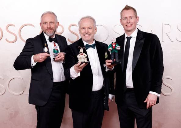 Richard Beek, Nick Park, and Merlin Crossingham arrive on the red carpet for the 97th Academy Awards in the Hollywood section of Los Angeles on Sunday, March 2, 2025.  LAP20250302719 JOHNxANGELILLO