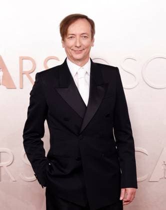 Volker Bertelmann arrives on the red carpet for the 97th Academy Awards in the Hollywood section of Los Angeles on Sunday, March 2, 2025.  LAP20250302734 JOHNxANGELILLO