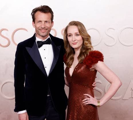 (L-R) Trent and Victoria Warmerdam arrive on the red carpet for the 97th Academy Awards in the Hollywood section of Los Angeles on Sunday, March 2, 2025.  LAP20250302749 JOHNxANGELILLO