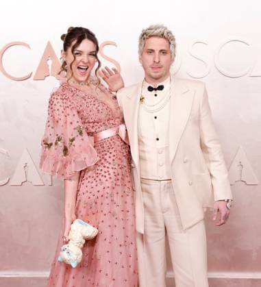 (L-R) Charlotte Lawrence and Andrew Watt arrive on the red carpet for the 97th Academy Awards in the Hollywood section of Los Angeles on Sunday, March 2, 2025.  LAP20250302751 JOHNxANGELILLO