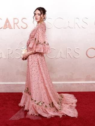 Charlotte Lawrence arrives on the red carpet for the 97th Academy Awards in the Hollywood section of Los Angeles on Sunday, March 2, 2025.  LAP20250302752 JOHNxANGELILLO