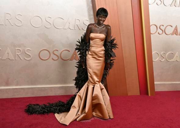 Anok Yai arrives on the red carpet for the 97th Academy Awards in the Hollywood section of Los Angeles on Sunday, March 2, 2025.  LAP20250302366 JIMxRUYMEN