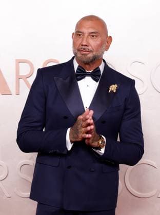 Dave Bautista arrives on the red carpet for the 97th Academy Awards in the Hollywood section of Los Angeles on Sunday, March 2, 2025.  LAP20250302818 JOHNxANGELILLO