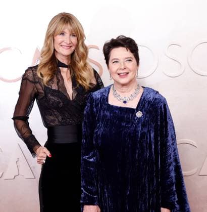 (L-R) Laura Dern and Isabella Rossellini arrive on the red carpet for the 97th Academy Awards in the Hollywood section of Los Angeles on Sunday, March 2, 2025.  LAP20250302833 JOHNxANGELILLO