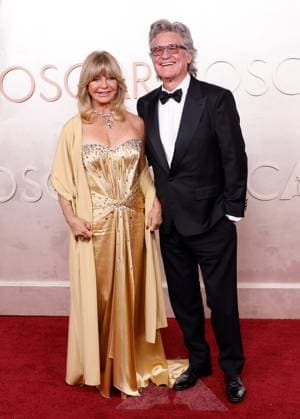 (L-R) Goldie Hawn and Kurt Russell arrive on the red carpet for the 97th Academy Awards in the Hollywood section of Los Angeles on Sunday, March 2, 2025.  LAP20250302840 JOHNxANGELILLO
