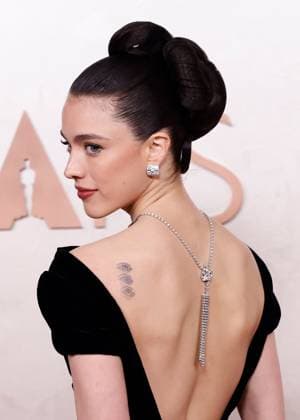 Margaret Qualley arrives on the red carpet for the 97th Academy Awards in the Hollywood section of Los Angeles on Sunday, March 2, 2025.  LAP20250302875 JOHNxANGELILLO