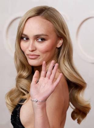 Lily-Rose Depp arrives on the red carpet for the 97th Academy Awards in the Hollywood section of Los Angeles on Sunday, March 2, 2025.  LAP20250302886 JOHNxANGELILLO