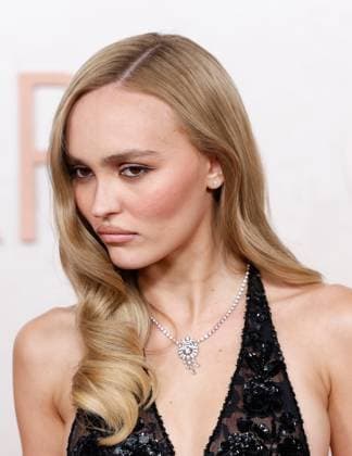Lily-Rose Depp arrives on the red carpet for the 97th Academy Awards in the Hollywood section of Los Angeles on Sunday, March 2, 2025.  LAP20250302885 JOHNxANGELILLO
