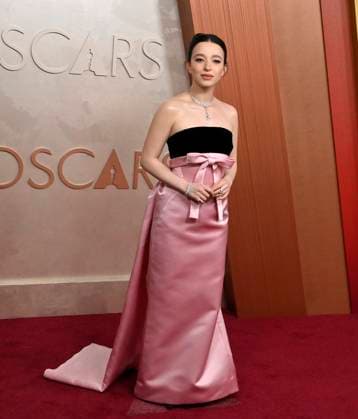 Mikey Madison arrives on the red carpet for the 97th Academy Awards in the Hollywood section of Los Angeles on Sunday, March 2, 2025.  LAP20250302389 JIMxRUYMEN