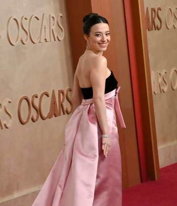 Mikey Madison arrives on the red carpet for the 97th Academy Awards in the Hollywood section of Los Angeles on Sunday, March 2, 2025.  LAP20250302392 JIMxRUYMEN