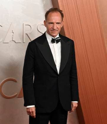 Ralph Fiennes arrives on the red carpet for the 97th Academy Awards in the Hollywood section of Los Angeles on Sunday, March 2, 2025.  LAP20250302405 JIMxRUYMEN