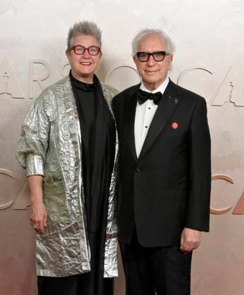 Mary Beth Heffernan and Howard A. Rodman arrive on the red carpet for the 97th Academy Awards in the Hollywood section of Los Angeles on Sunday, March 2, 2025.  LAP20250302463 JIMxRUYMEN