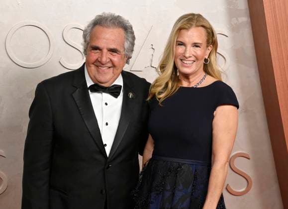 (L-R) Jim Gianopulos and Ann Gianopulos arrive on the red carpet for the 97th Academy Awards in the Hollywood section of Los Angeles on Sunday, March 2, 2025.  LAP20250302477 JIMxRUYMEN