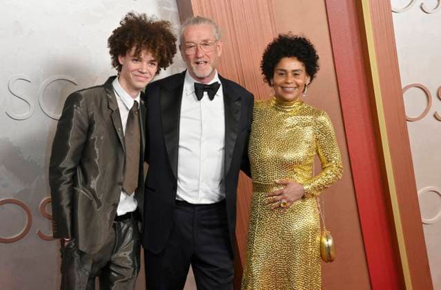 Hamish Hamilton (in the center) arrives on the red carpet for the 97th Academy Awards in the Hollywood section of Los Angeles on Sunday, March 2, 2025.  LAP20250302487 JIMxRUYMEN
