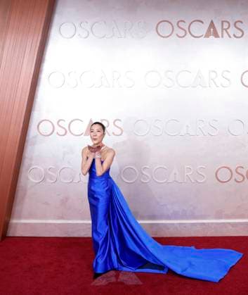 Michelle Yeoh arrives on the red carpet for the 97th Academy Awards in the Hollywood section of Los Angeles on Sunday, March 2, 2025.  LAP202503029008 JOHNxANGELILLO