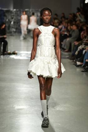 PFW - Cecilie Bahnsen Runway A model walks the runway for a collection by Cecilie Bahnsen as part of Paris Fashion Week at the Palais de Tokyo in Paris, on March 5, 2025. Photo by Firas Abdullah ABACAPRESS.COM Paris Ile-de-France France  Copyright: xAbdullahxFiras ABACAx