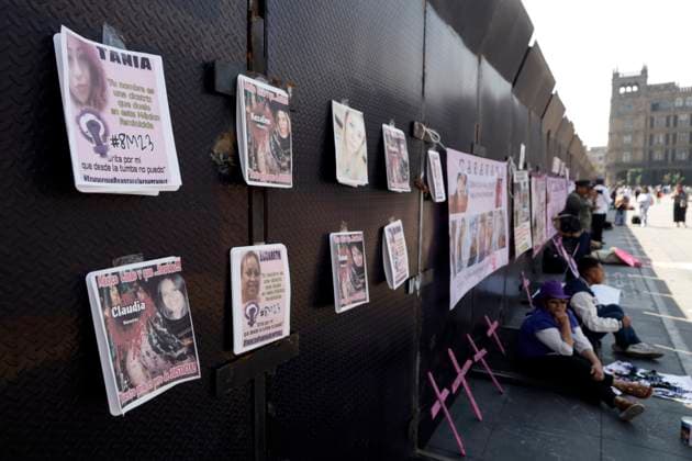 Collectives of mothers of missing persons paste posters of the victims of femicide in the main square Zocalo demanding justice for all femicides in Mexico prior to International Women s Day. on March 5, 2025 in Mexico City, Mexico. Mexico City Mexico - ZUMAe321 20250305_zia_e321_090 Copyright: xLuisxBarronx