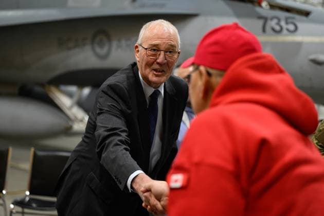 March 6, 2025, Iqaluit, Nu, Canada: Defence Minister Bill Blair shakes the hand of a Canadian Ranger following an announcement about increasing the Canadian Armed Forces presence and readiness across the Arctic and the North during a press conference in Iqaluit on Thursday, March 6, 2025. Iqaluit Canada  - ZUMAc35_ 20250306_zaf_c35_033 Copyright: xDustinxPatarx