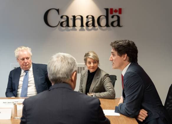 March 7, 2025, Montreal, Pq, CANADA: Prime Minister Justin Trudeau,right, flanked by from left to right, Jean Charest, member of his council on Canada-U.S. relations, Foreign Affairs Minister Melanie Joly, and Minister of Innovation, Science and Industry Francois-Philippe Champagne hosts a round table with business community leaders in Montreal on Friday, March 7, 2025. Montreal CANADA - ZUMAc35_ 20250307_zaf_c35_044 Copyright: xChristinnexMuschix