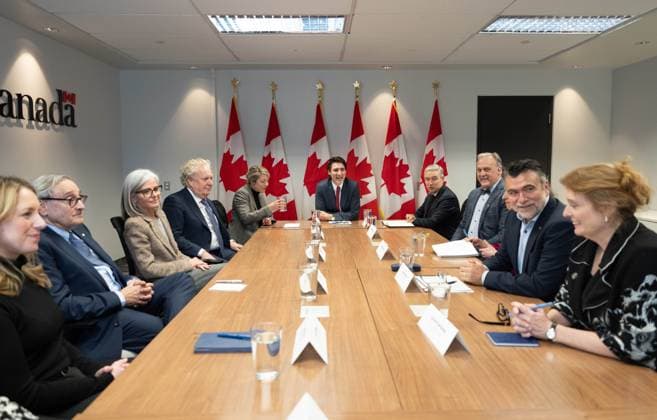 March 7, 2025, Montreal, Pq, CANADA: Prime Minister Justin Trudeau, centre, flanked by Foreign Affairs Minister Melanie Joly, and Minister of Innovation, Science and Industry Francois-Philippe Champagne hosts a round table with business community leaders in Montreal on Friday, March 7, 2025. Montreal CANADA - ZUMAc35_ 20250307_zaf_c35_047 Copyright: xChristinnexMuschix