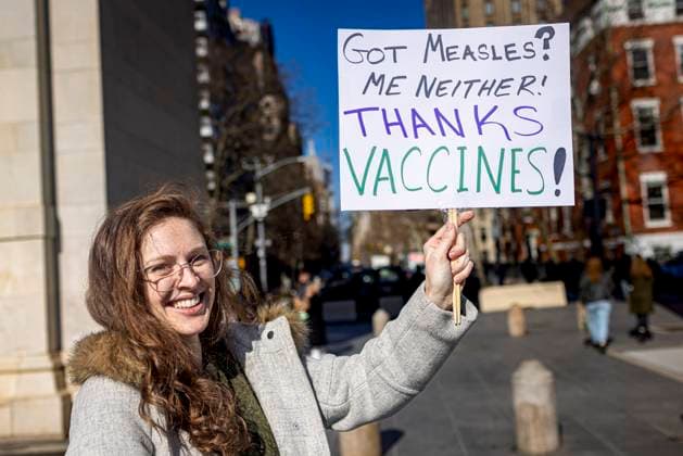 Stand Up for Science rally in New York City A protestor holds a sign that reads Got Measles? Me neither. Thanks Vaccines as hundreds of demonstrators ??participate in a Stand Up For Science rally at Washington Square Park on March 7, 2025? in New York City. Hundreds of Academic Workers, elected officials?, and allies protest?ed against the Trump administration and Elon Musk s Department Of Government Efficiency (DOGE)?, who are freezing ?public funding for science research.? New York City New York United States Copyright: MichaelxNigro