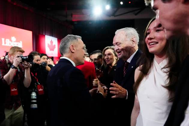March 9, 2025, Ottawa, On, CAN: Liberal Party of Canada Leader Mark Carney shakes hands with former prime minister Jean Chretien after being announced as winner at the party s event in Ottawa, Sunday, March 9, 2025. Ottawa CAN  - ZUMAc35_ 20250309_zaf_c35_228 Copyright: xJustinxTangx