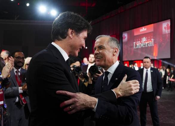 March 9, 2025, Ottawa, Ontario, Canada: Liberal Party of Canada Leader Mark Carney speaks to Prime Minister Justin Trudeau after Carney was announced as the winner of the party leadership at the announcement event in Ottawa, Sunday, March 9, 2025. Ottawa Canada  - ZUMAc35_ 20250309_zaf_c35_311 Copyright: xSeanxKilpatrickx