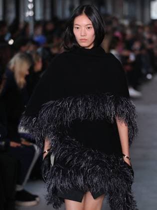 PFW - Sacai Runway Model walks the runway at the Sacai Fashion show during the Paris Fashion Week on March 10, 2025 in Paris, France. Photo by Alain-Gil Gonzalez ABACAPRESS.COM Paris France  Copyright: xGonzalezxAlain-Gil ABACAx