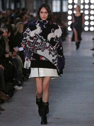PFW - Sacai Runway Model walks the runway at the Sacai Fashion show during the Paris Fashion Week on March 10, 2025 in Paris, France. Photo by Alain-Gil Gonzalez ABACAPRESS.COM Paris France  Copyright: xGonzalezxAlain-Gil ABACAx