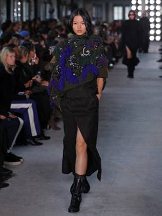 PFW - Sacai Runway Model walks the runway at the Sacai Fashion show during the Paris Fashion Week on March 10, 2025 in Paris, France. Photo by Alain-Gil Gonzalez ABACAPRESS.COM Paris France  Copyright: xGonzalezxAlain-Gil ABACAx