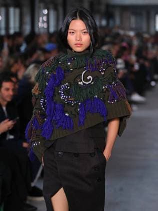 PFW - Sacai Runway Model walks the runway at the Sacai Fashion show during the Paris Fashion Week on March 10, 2025 in Paris, France. Photo by Alain-Gil Gonzalez ABACAPRESS.COM Paris France  Copyright: xGonzalezxAlain-Gil ABACAx