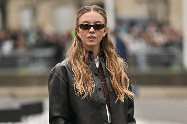 PFW Miu Miu Outside Arrivals Sydney Sweeney arriving at Miu Miu show during Paris Fashion Week in Paris, France on March 11, 2025. Photo by Julien Reynaud APS-Medias ABACAPRESS.COM Paris France  Copyright: xReynaudxJulien APS-Medias ABACAx