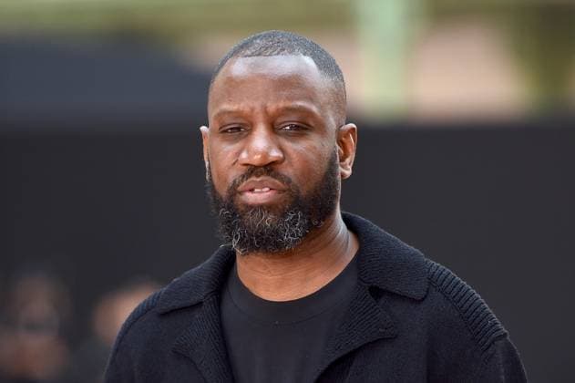 PFW - Chanel Photocall Abd Al Malik attends the Chanel Womenswear Fall Winter 2025-2026 show as part of Paris Fashion Week at Grand Palais on March 11, 2025 in Paris, France. - EDITORIAL USE ONLY - Photo by Franck Castel ABACAPRESS.COM Paris France  Copyright: xCastelxFranck ABACAx