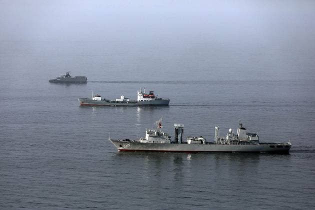 March 11, 2025, Indian Ocean, Gulf Of Oman, Iran: A Chinese People s Liberation Army Navy replenishment ship cruising with a Russian Navy tanker vessel during joint military drills in the Indian Ocean and the Gulf of Oman. On the second day of the joint naval drill Maritime Security Belt 2025, naval forces from Iran, Russia, and China conducted aerial photography exercises and tactical formation maneuvers in the Indian Ocean and the Gulf of Oman. Helicopters from the Iranian Navy and the IRGC are monitoring the three-day exercise. The drill aims to enhance coordination among participating forces and strengthen maritime cooperation. Indian Ocean Iran - ZUMAi98_ 20250311_zih_i98_005 Copyright: xIranianxArmyxOfficex