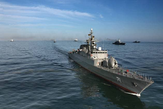 March 11, 2025, Indian Ocean, Gulf Of Oman, Iran: Iranian Navy frigate IRIS Alvand (71) during joint military drills in the Indian Ocean and the Gulf of Oman. On the second day of the joint naval drill Maritime Security Belt 2025, naval forces from Iran, Russia, and China conducted aerial photography exercises and tactical formation maneuvers in the Indian Ocean and the Gulf of Oman. Helicopters from the Iranian Navy and the IRGC are monitoring the three-day exercise. The drill aims to enhance coordination among participating forces and strengthen maritime cooperation. Indian Ocean Iran - ZUMAi98_ 20250311_zih_i98_022 Copyright: xIranianxArmyxOfficex