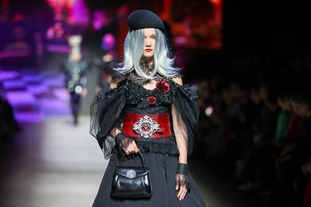 RUSSIA, MOSCOW - MARCH 13, 2025: A woman models one of the creations during a runway show for the Moscow Art and Industry Institute collection as part of the 4th Moscow Fashion Week at the Manege Central Exhibition Hall (Moscow Manege). Yevgeny Messman TASS  79068166