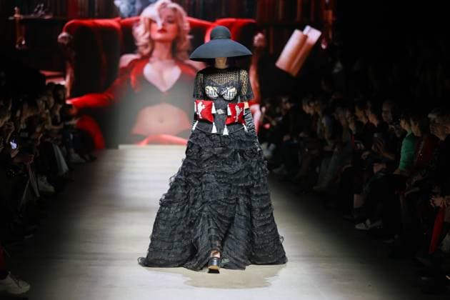 RUSSIA, MOSCOW - MARCH 13, 2025: A woman models one of the creations during a runway show for the Moscow Art and Industry Institute collection as part of the 4th Moscow Fashion Week at the Manege Central Exhibition Hall (Moscow Manege). Yevgeny Messman TASS  79068169