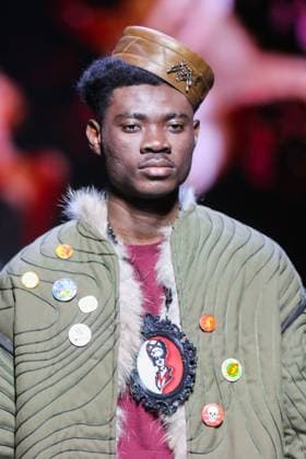 RUSSIA, MOSCOW - MARCH 13, 2025: A Black man models one of the creations during a runway show for the Moscow Art and Industry Institute collection as part of the 4th Moscow Fashion Week at the Manege Central Exhibition Hall (Moscow Manege). Yevgeny Messman TASS  79070109