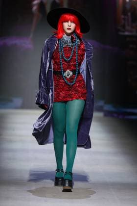RUSSIA, MOSCOW - MARCH 13, 2025: A woman models one of the creations during a runway show for the Moscow Art and Industry Institute collection as part of the 4th Moscow Fashion Week at the Manege Central Exhibition Hall (Moscow Manege). Yevgeny Messman TASS  79070147