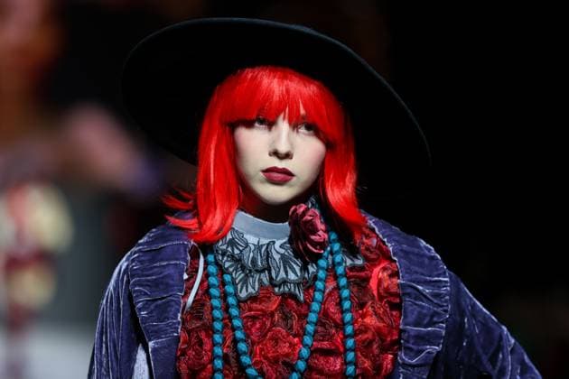 RUSSIA, MOSCOW - MARCH 13, 2025: A woman models one of the creations during a runway show for the Moscow Art and Industry Institute collection as part of the 4th Moscow Fashion Week at the Manege Central Exhibition Hall (Moscow Manege). Yevgeny Messman TASS  79070149