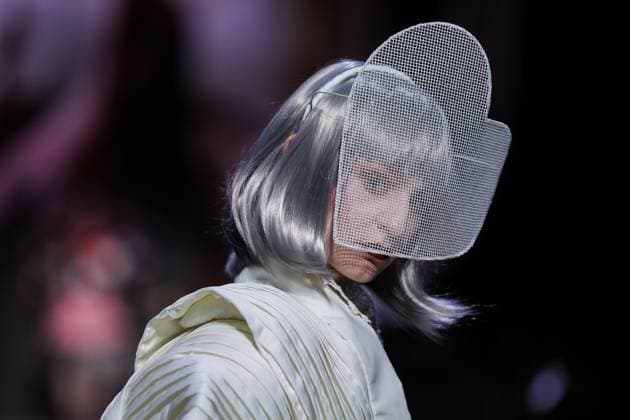 RUSSIA, MOSCOW - MARCH 13, 2025: A woman models one of the creations during a runway show for the Moscow Art and Industry Institute collection as part of the 4th Moscow Fashion Week at the Manege Central Exhibition Hall (Moscow Manege). Yevgeny Messman TASS  79070150